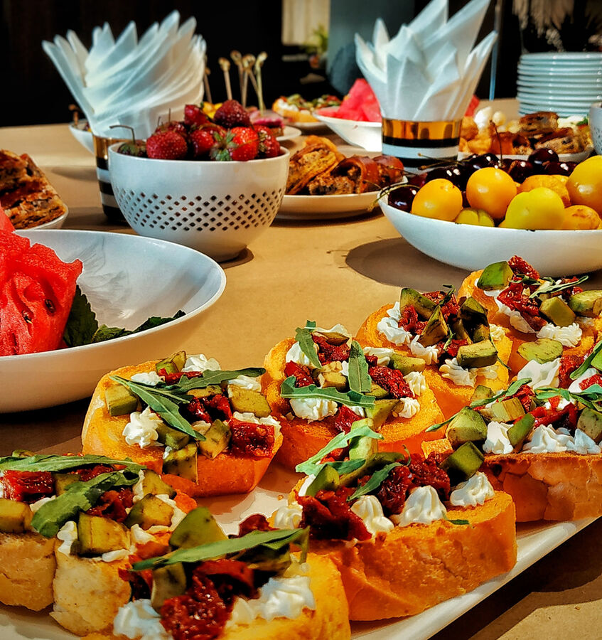 Elegantly plated catering dishes at a corporate event