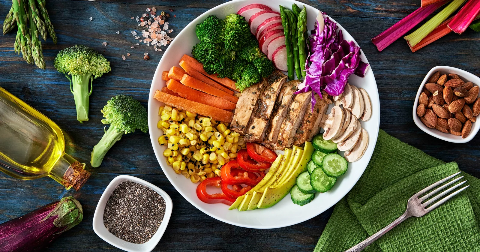 Grilled chicken with colourful vegetables on a Western-style plate