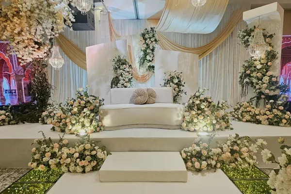 Floral wedding stage at Furama City Centre