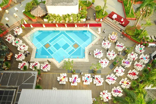 Outdoor event setup beside the pool at The Landmark Ballroom at Bugis